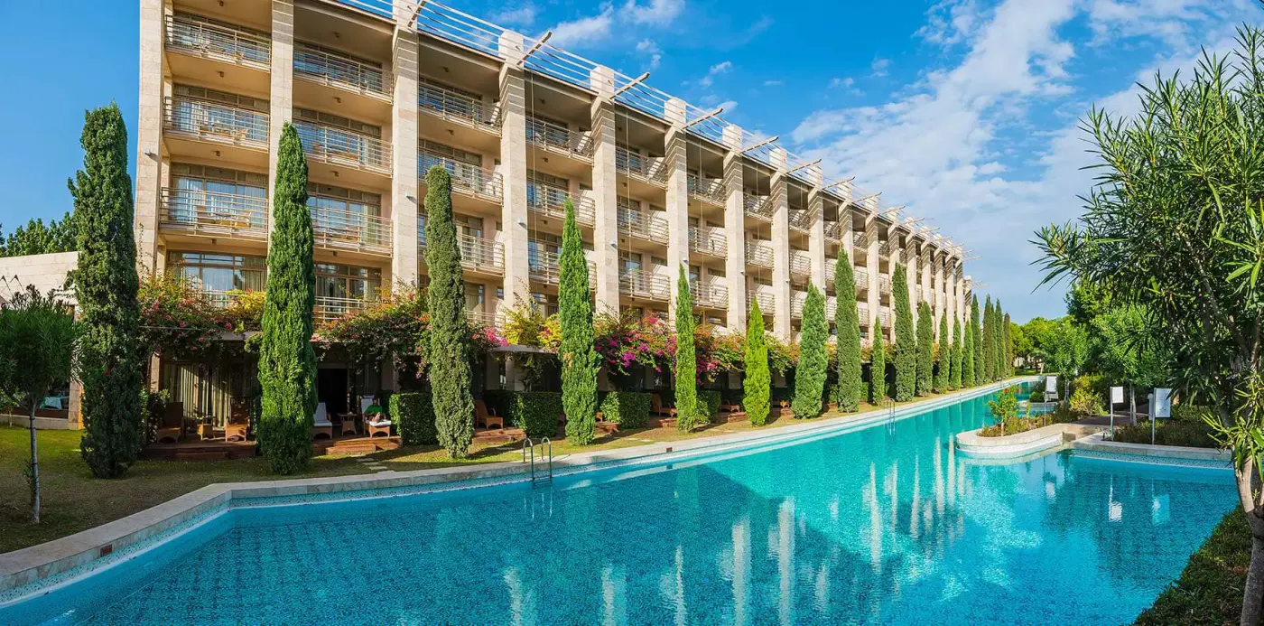 Main outdoor pool along the Gloria Serenity Resort building