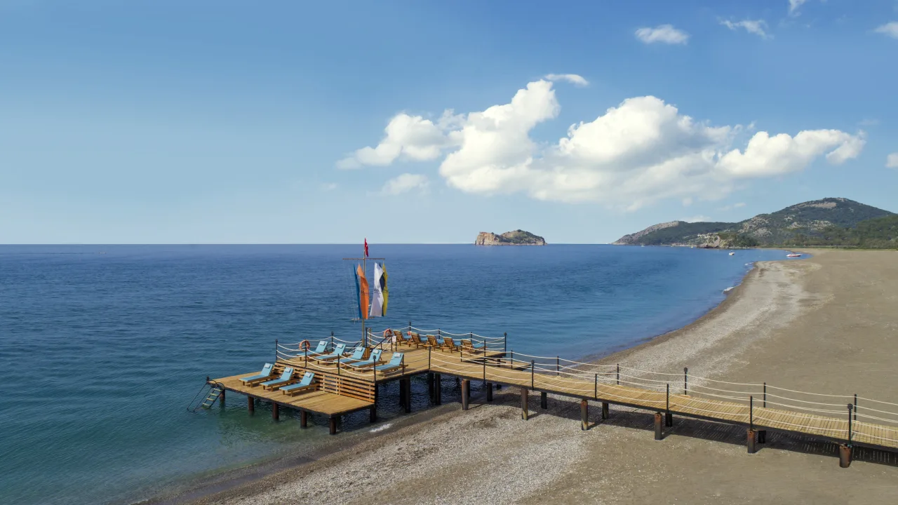 Private beach and pier at Hilton Dalaman Sarıgerme Resort & Golf