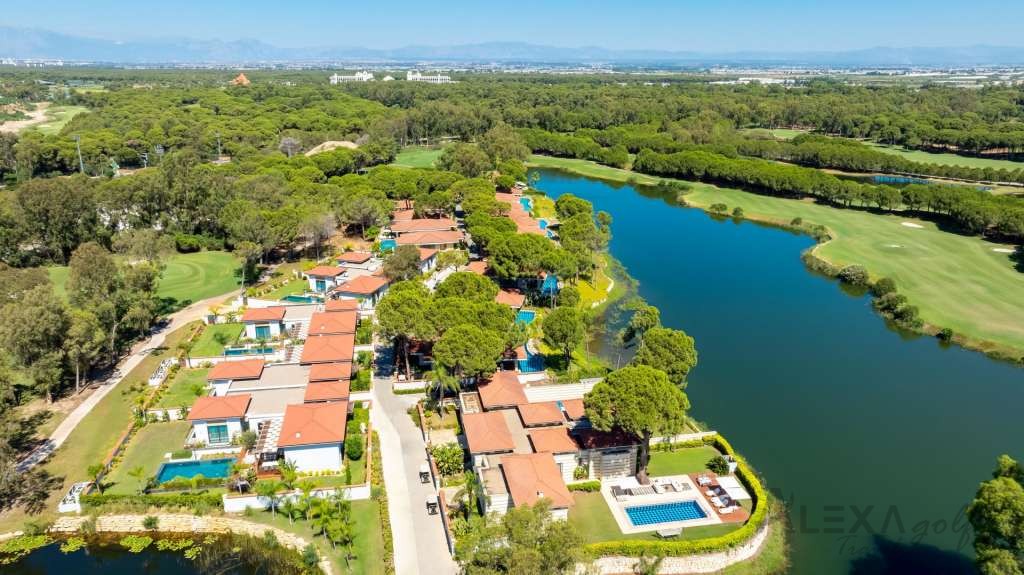 Golf-side villas and lake landscape beside Kempinski The Dome