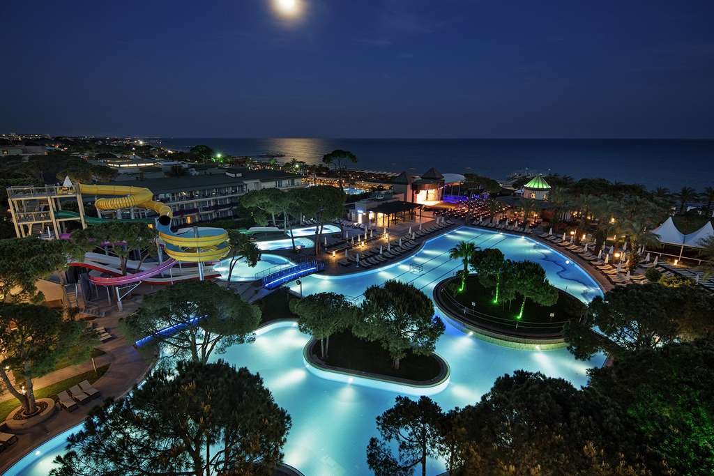 Papillon Ayscha pools and aquapark illuminated in the evening