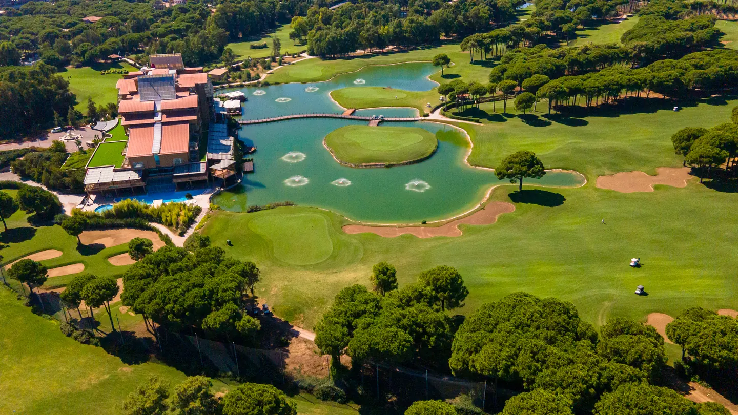 Aerial view of Sueno Hotels Golf Belek beside the lakes and golf greens